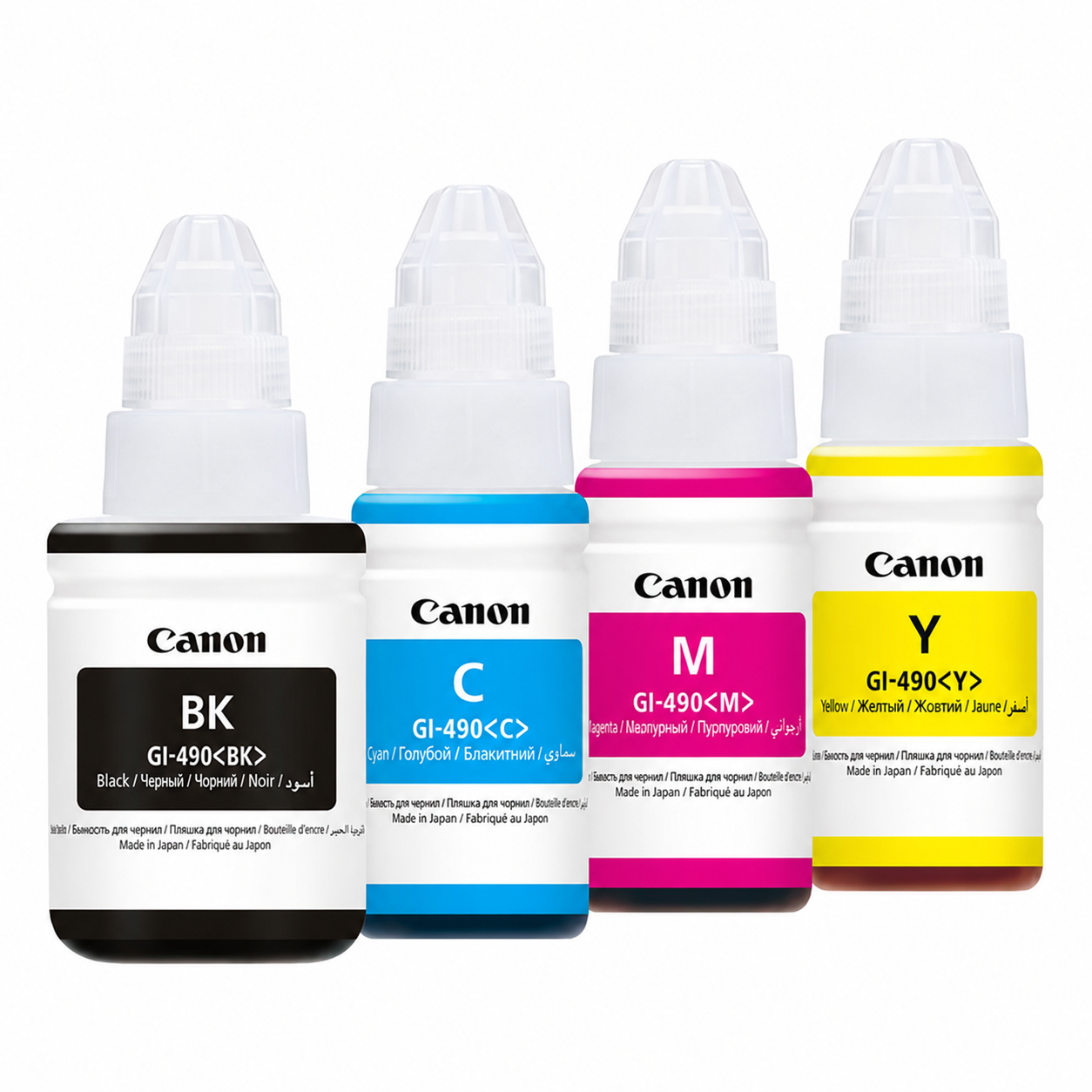 Close-up of Canon GI-490 original ink bottles showing the black, cyan, magenta and yellow color codes for PIXMA G-Series printers.