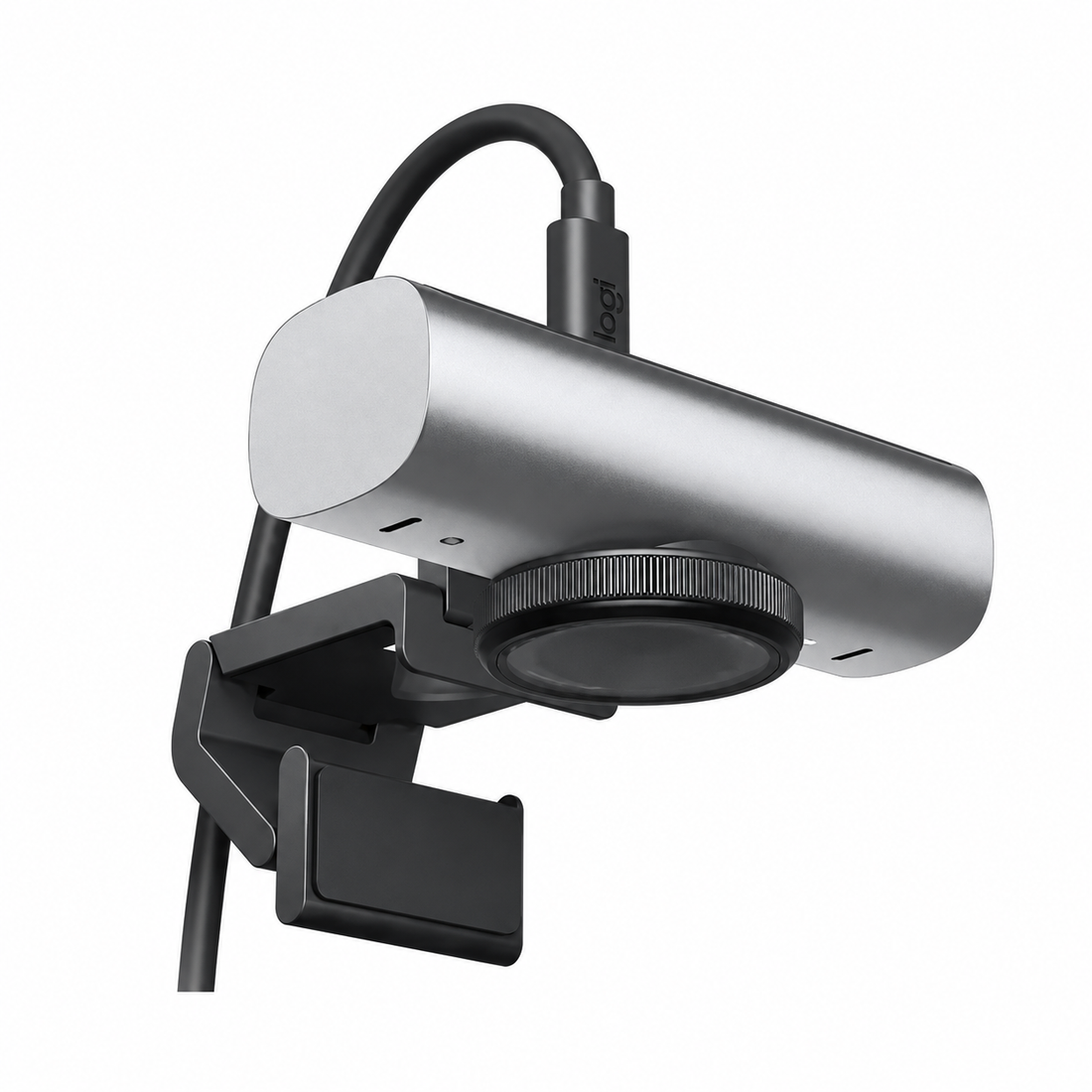Logitech MX Brio Ultra HD 4K webcam front view showing the graphite body, large camera lens and universal monitor mount