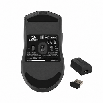 Redragon M916 PRO 4K gaming mouse bottom view showing the optical sensor, control switches and wireless receiver accessories