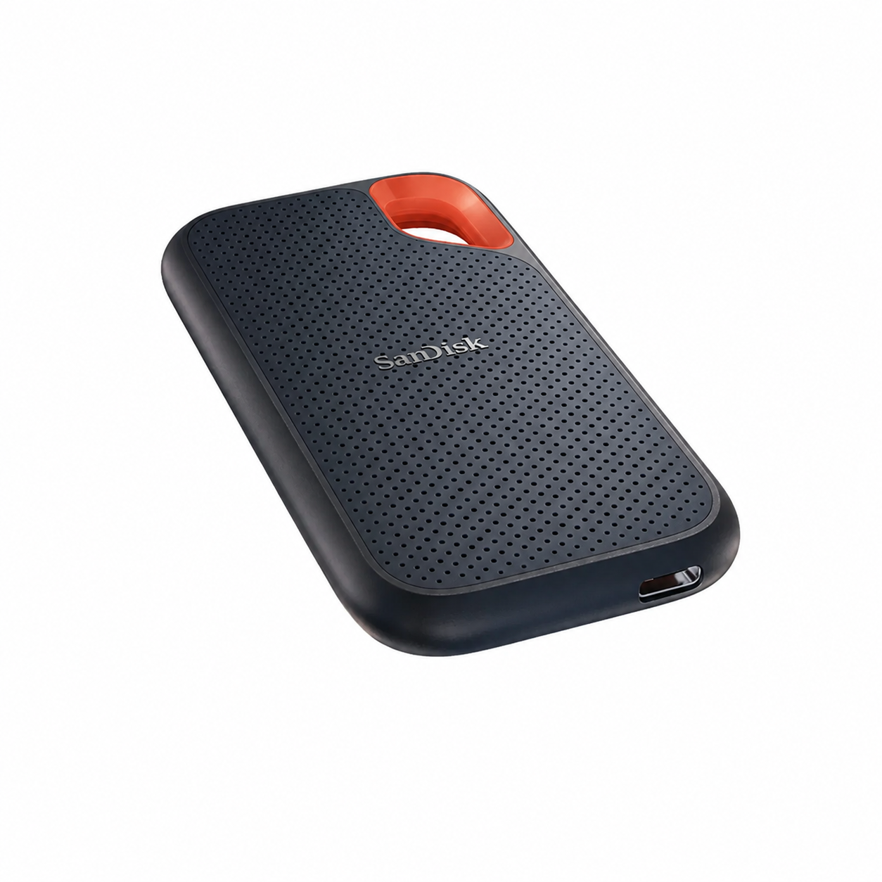 SanDisk Extreme PRO Portable 1TB SSD flat angled view highlighting the compact textured design and orange corner loop
