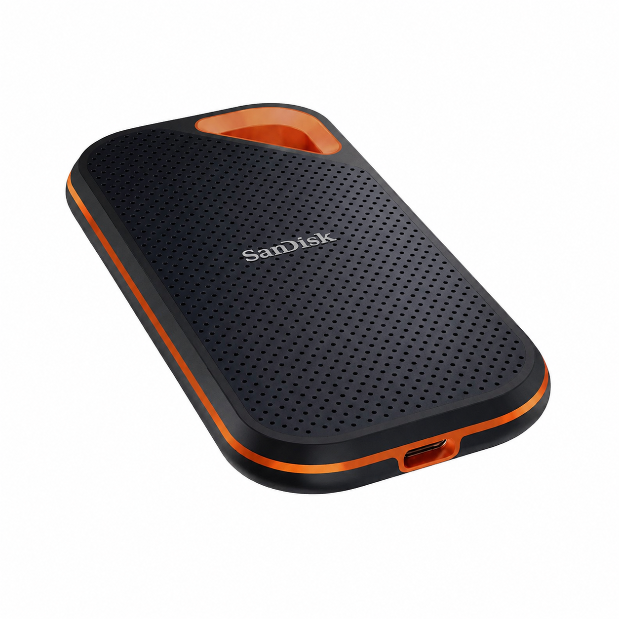 SanDisk Extreme PRO Portable 4TB SSD angled view showing the textured enclosure, orange protective edge and USB-C port
